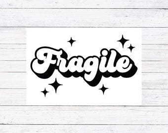 May include: Black and white graphic design with the word "Fragile" in a retro font with stars around it.