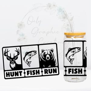 May include: A clear glass jar with a bamboo lid and a black and white graphic that says "Hunt Fish Run" and a fish. The jar has a straw in it.
