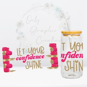 May include: A clear glass tumbler with a bamboo lid and a straw. The tumbler has a pink and gold design with the text "Let your confidence shine".