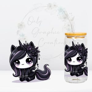 May include: A clear glass tumbler with a bamboo lid and a black and white cartoon unicorn with black roses in its hair. The unicorn is wearing a black dress and has a black tail. The tumbler is decorated with the same unicorn design.