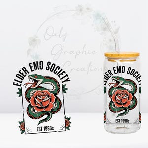 May include: A clear glass tumbler with a bamboo lid and a metal straw. The tumbler features a graphic of a green snake coiled around a red rose, with the text "ELDER EMO SOCIETY EST 1990s".