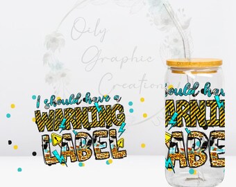 May include: A clear glass tumbler with a bamboo lid and a straw. The tumbler has a graphic design with the text "I should have a warning label" in yellow, black, and blue.
