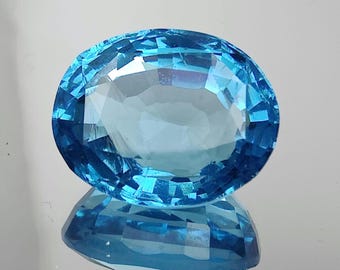 10,80 carats de tourmaline paraiba bleu néon, taille ovale (14 x 11 mm)
