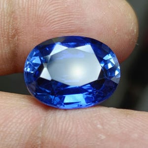 Authentic certified Sri Lanka Blue Sapphire Faceted Loose Oval Gemstone 11.75 CT.Ethical Sourced Sri Lanka Sapphire Luxury jewelry Gold Ring