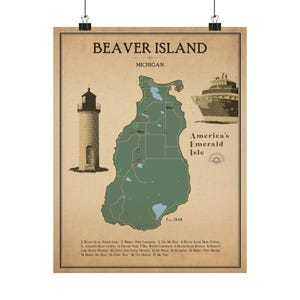 May include: A vintage-style map of Beaver Island, Michigan, with the text "America's Emerald Isle" and "Est. 1845". The map is green and brown with a lighthouse and a boat in the background.