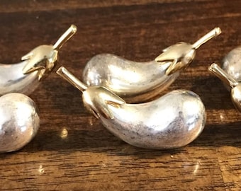 Juego de 6 soportes para cuchillos de cocina y hogar coleccionables, en dos tonos de plata y oro, con diseño de berenjena.