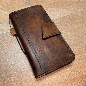Capa de couro genuíno para Apple iPhone 7 811 12 13 14 15 16 Pro Max Plus Mini SE XS Capa tipo carteira com design magnético Capa de couro por Art Amit