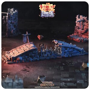 May include: A miniature dungeon set with a collapsing bridge, a spiked pit, and a stone wall. The set is painted in shades of blue and gray, with a diamond-shaped gem in the background. The set is part of a larger collection of miniature dungeon terrain.