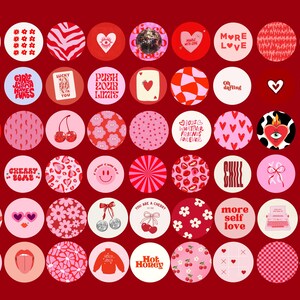 May include: A collection of 36 red and pink illustrated stickers with various designs and text. The stickers feature hearts, cherries, flowers, and other designs. The text on the stickers includes phrases like "More Love", "Happy Hour", "No Bad Days", and "Cherry Bomb".