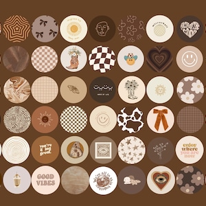 Puede incluir: Un conjunto de 36 pegatinas redondas con varios dise&ntilde;os, que incluyen patrones abstractos, ilustraciones y texto. Las pegatinas son de varios colores, incluyendo marr&oacute;n, blanco, negro y beige. Las pegatinas est&aacute;n dispuestas en una cuadr&iacute;cula sobre un fondo marr&oacute;n.