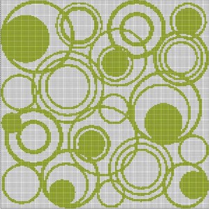 May include: A pattern of overlapping green circles and solid green circles on a white grid background. The circles vary in size and are outlined in a darker green, creating a textured effect. The design is a repeating pattern.
