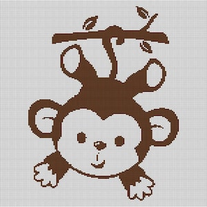 May include: A brown and white cartoon monkey hanging from a branch with leaves. The monkey has a smiling face, large ears, and is designed in a pixelated style. The background is a grid pattern.