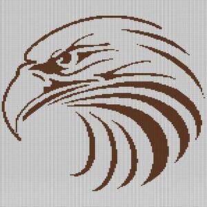May include: A brown eagle head design on a grid background. The eagle's profile is detailed with curved lines, showing the beak, eye, and feathers. The design is a pixelated, graphic representation of an eagle.