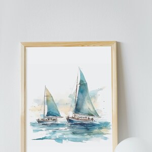 May include: A watercolor painting of two sailboats on the water. The sailboats are blue and white with green sails. The water is a light blue color and there is a light blue sky in the background.