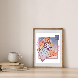 Peut inclure: Une impression d'art encadrée représentant un tigre stylisé. Le tigre est représenté dans des tons orange, blanc et bleu, avec une expression sereine. Des fleurs roses et des formes géométriques encadrent le tigre sur un fond dégradé. Le cadre est en bois.