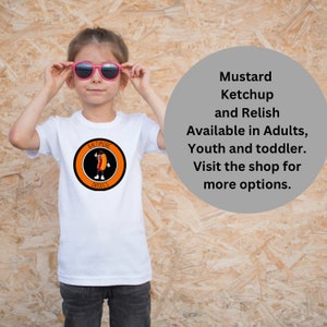 Laufen Sie zum Sieg mit dem Orioles Ketchup Hotdog Rassen Champion-T-Shirt