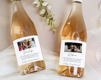 May include: Two bottles of rose wine with personalized labels. The labels feature photos of couples and the text "I've waited something big, something new, something truly worth waiting for. And most importantly... you. Will you be my boyfriend?"