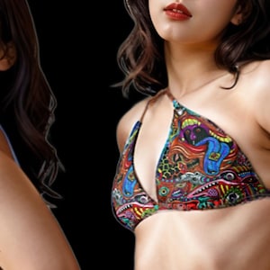 May include: Two women wearing colorful patterned bikini tops. The tops have a triangle shape and are tied at the neck and back. The women have long dark hair and are looking at the camera.
