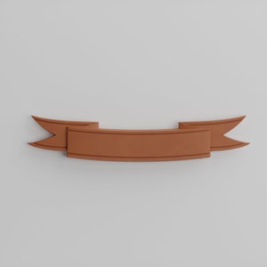 May include: A brown ribbon banner with a blank space in the center. The banner is curved and has a 3D effect.