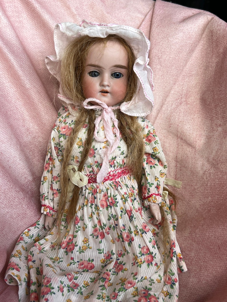 Tête de poupée Armand Marseille en biscuit antique, moule #370