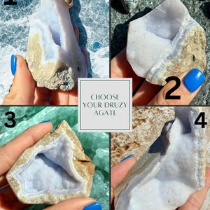 May include: Four pieces of raw, natural druzy agate in various shapes and sizes. The agate features a light blue and white crystalline interior, encased in a rough, beige-coloured exterior. The image includes the text "CHOOSE YOUR DRUZY AGATE".