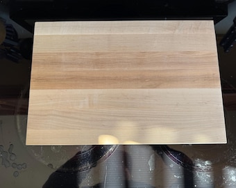 Personalized maple cutting board with custom engraving by Design-Engrave.