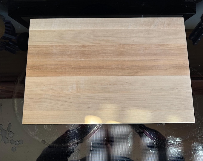 Personalized maple cutting board with custom engraving by Design-Engrave.
