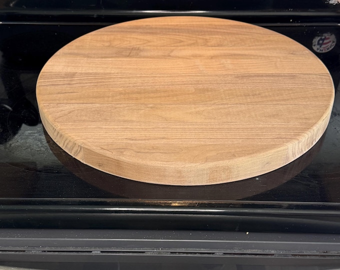 American Walnut edge grain cutting board personalized with custom laser engraving by Design-Engrave. Great unique gift. 18" round 1.5" thick