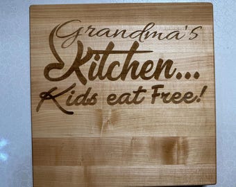 Engraved cutting board made from American maple edge grain wood.