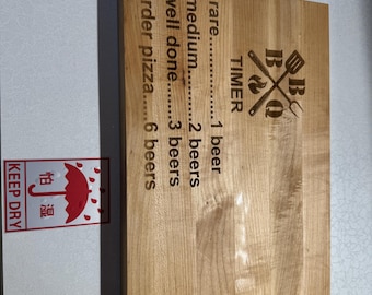 Engraved cutting board made from maple edge grain wood.