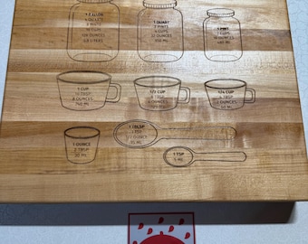 Engraved Conversion chart cutting board made from American maple edge grain wood.
