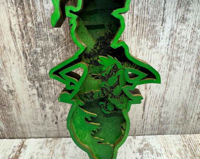 Layered grinch Christmas decor. Laser cut and painted.