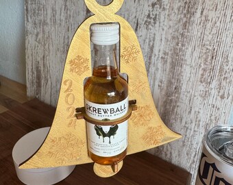 Shooter Christmas ornament. Bell shape engraved and laser cut.