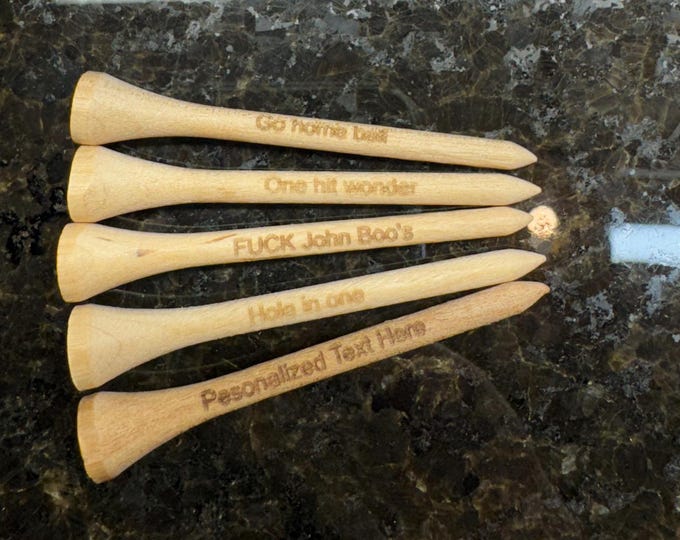 Personalized golf tees. Get what ever you want engraved on them.