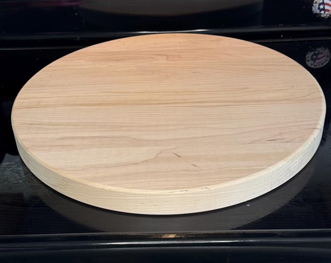 Personalized round American maple cutting board with custom engraving by Design-Engrave. 18" round 1.5" thick.