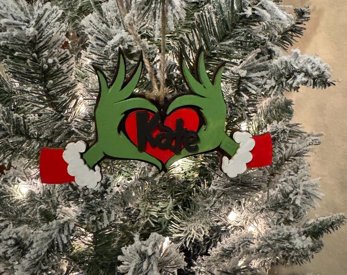 Personalized Grinch themed ornament laser cut and hand painted.