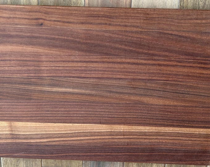 Personalized Walnut cutting board with custom laser engraving by Design-Engrave.