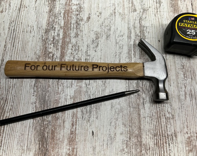 Laser engraved hammer handle with For our future projects engraved.