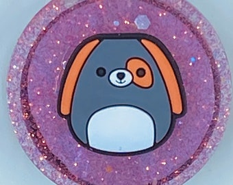 This resin popsocket has a squishmallow gray dog shoe charm and is secured with strong glue.  It is under 15 dollars and is ready to ship.