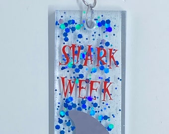 Shark week keychain and you can use it all the time.