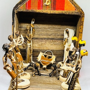 Tanzanian African Christmas Nativity Scene made of banana leaves and naasai shuka, handcrafted by Maasai women