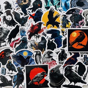 May include: A collection of crow and raven themed stickers. The stickers feature various designs, including crows in flight, crows perched on branches, and crows with flowers. Some stickers have a black background with white text, such as "Nevermore".