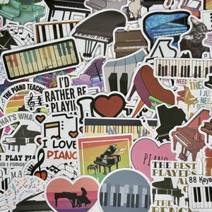 May include: A collection of colorful piano-themed stickers with various designs, including musical notes, keyboards, and the text "I'd rather be playing".
