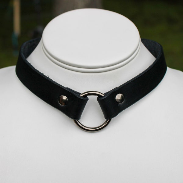 Black Leather choker with metal hardware. Any size and made to order. Snap fasteners with 3 adjustable sizes.