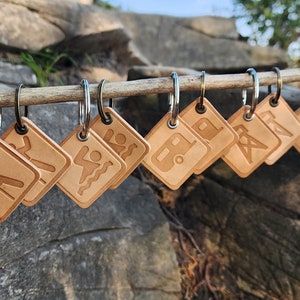Leather National Park icon key chains with 150 options to choose from. Make your keychain personalized to your favorite activities.