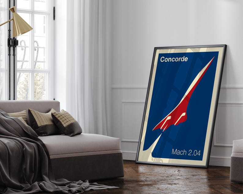 May include: A blue and red poster with a white silhouette of the Concorde supersonic jet. The poster has the text "Concorde" and "Mach 2.04" printed on it.