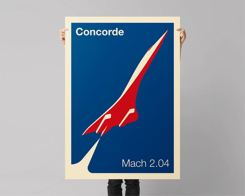May include: A blue and red poster with a white border featuring a silhouette of the Concorde supersonic jet. The poster reads "Concorde" and "Mach 2.04".