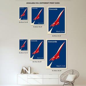 May include: Six different sizes of a vintage-style poster featuring a red and white Concorde supersonic jet against a blue background. The poster text reads "Concorde" and "Mach 2.04". The poster sizes are listed in both inches and centimeters.