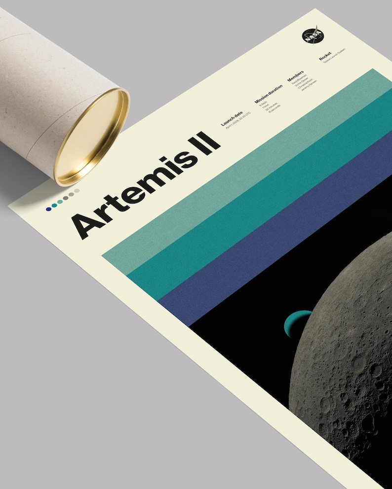 May include: A poster for the Artemis II mission, featuring a retro design with the NASA logo. The poster has a cream background with horizontal stripes in teal and blue. The image includes a depiction of the moon and a cylindrical poster tube.