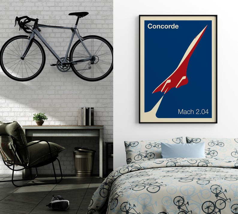 May include: A black and white poster with a red and white Concorde supersonic jet against a blue background. The poster reads "Concorde" and "Mach 2.04".